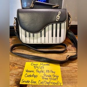 Small piano shaped crossbody purse